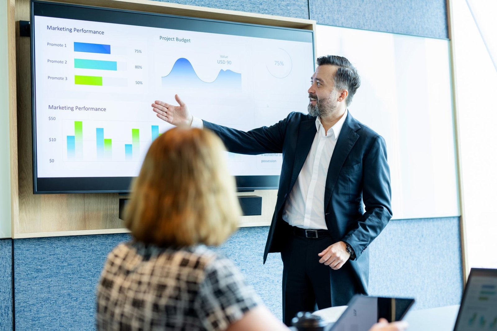 Business consultant presenting marketing and financial data